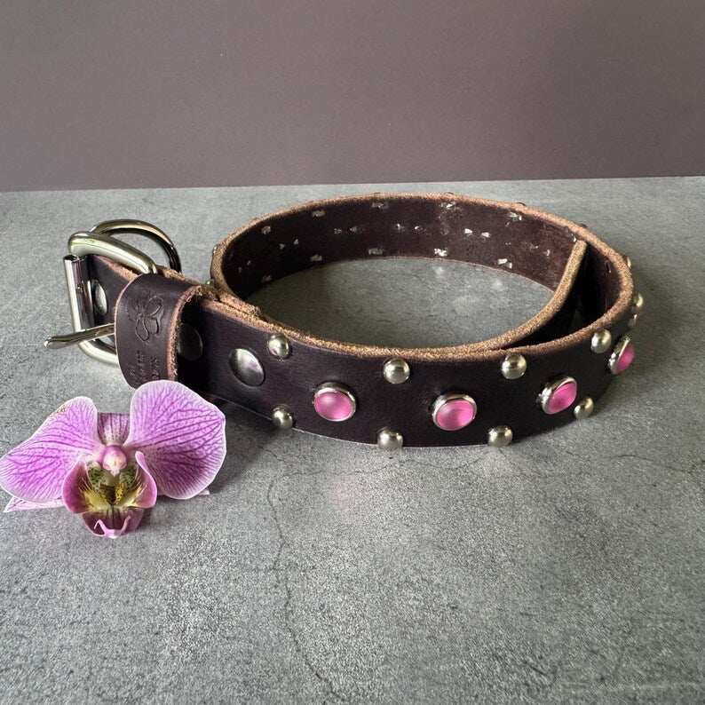 The Aurora Collar detail with silver studs and pink gemstone accents